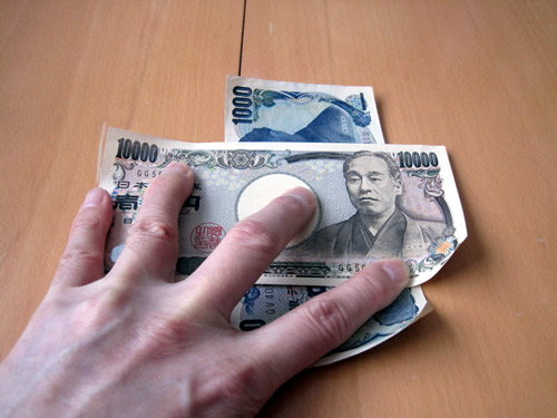 一万円札が上になり、千円札が下になっているというマジック